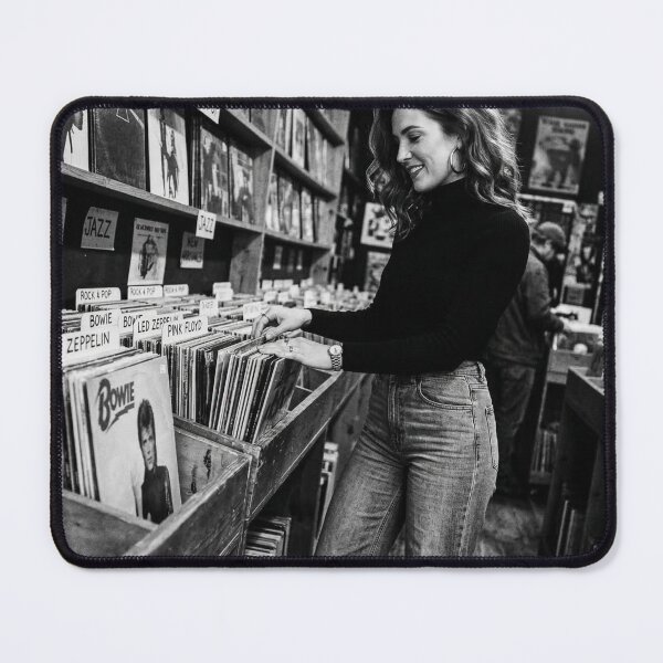 Item preview, Young Woman Browsing Vintage Vinyl Records in Store designed and sold by NiceArtsPlace.