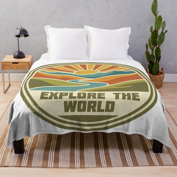 Item preview, Vintagestyle circular emblem featuring a vibrant sunrise over mountains and river with the text explore the world designed and sold by Robo-toons.