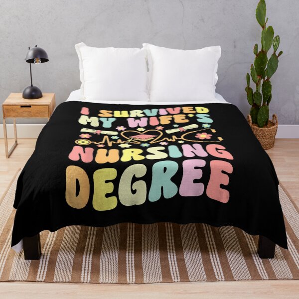 Item preview, i survived my wife's nursing degree graduation groovy designed and sold by Goleon12.