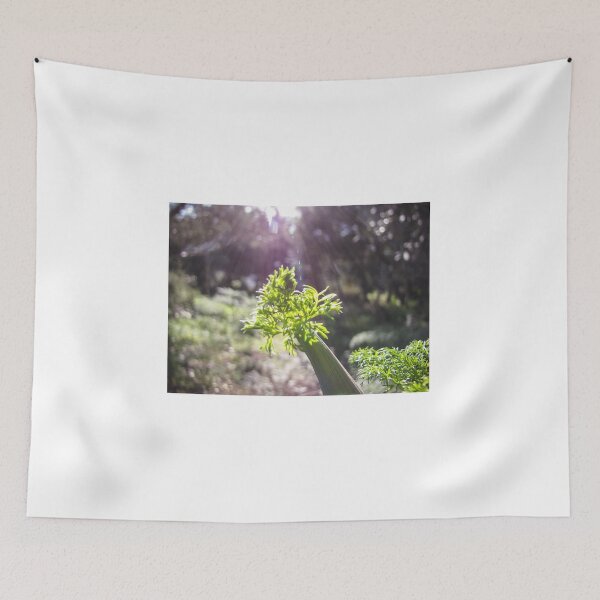 Item preview, Green Plant Stem With Sunlight Rays and Fresh Foliage in Soft Garden Bokeh designed and sold by Nmallia.