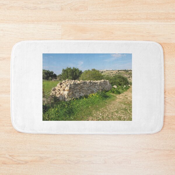 Item preview, Dry Stone Wall Along Rural Countryside Path With Wildflowers and Mediterranean Landscape designed and sold by Nmallia.