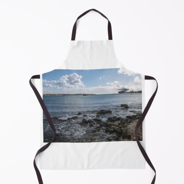 Item preview, Calm Rocky Shoreline Overlooking Cargo Ship and Industrial Port Under Cloudy Sky designed and sold by Nmallia.