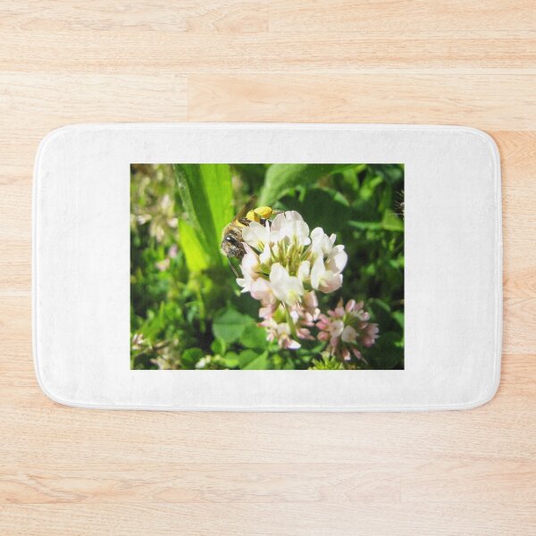 Item preview, Honeybee Collecting Pollen On White Clover Flower In Sunny Green Meadow Close-Up designed and sold by Nmallia.