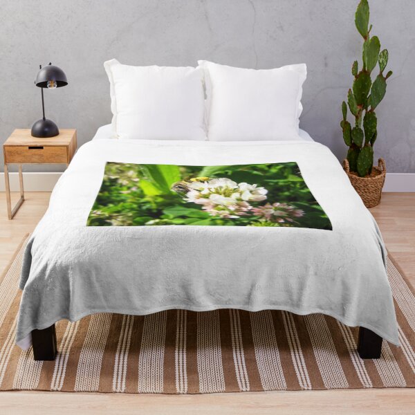 Item preview, Honeybee Collecting Pollen On White Clover Flower In Sunny Green Meadow Close-Up designed and sold by Nmallia.