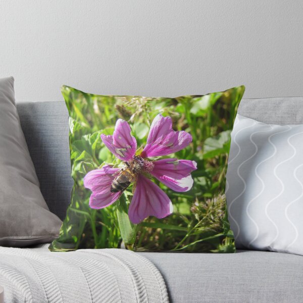 Item preview, Close-Up Of Honeybee Pollinating Pink Wildflower In Sunny Meadow Grass designed and sold by Nmallia.