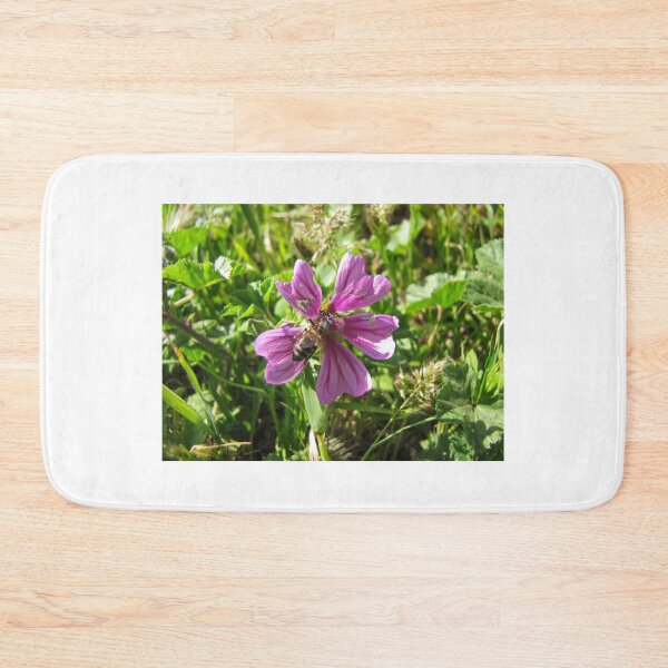 Item preview, Close-Up Of Honeybee Pollinating Pink Wildflower In Sunny Meadow Grass designed and sold by Nmallia.
