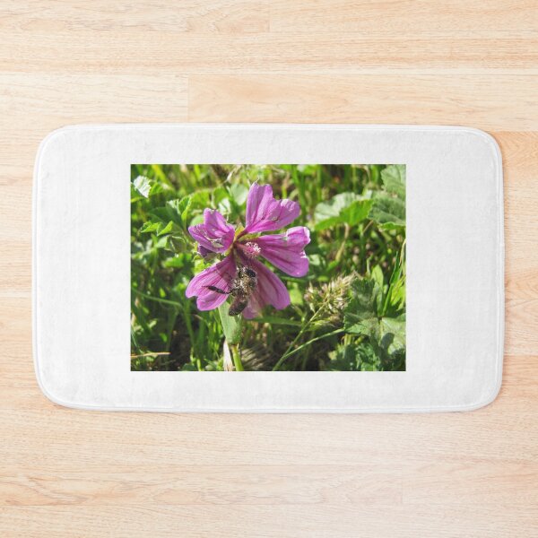 Item preview, Close-Up Of Honeybee Pollinating Pink Wildflower In Sunny Meadow Grass designed and sold by Nmallia.