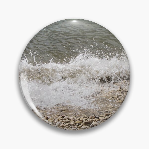 Item preview, Pebble Beach Shoreline With Breaking Waves and Rocky Coastline On A Calm Sea designed and sold by Nmallia.