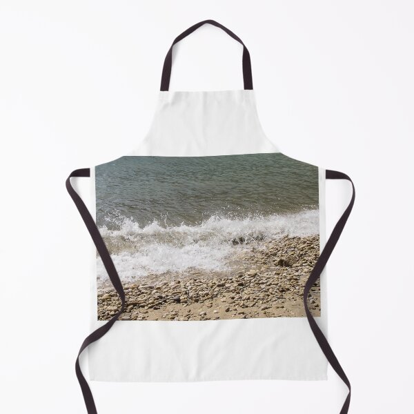 Item preview, Pebble Beach Shoreline With Breaking Waves and Rocky Coastline On A Calm Sea designed and sold by Nmallia.