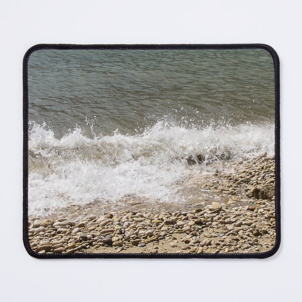 Item preview, Pebble Beach Shoreline With Breaking Waves and Rocky Coastline On A Calm Sea designed and sold by Nmallia.