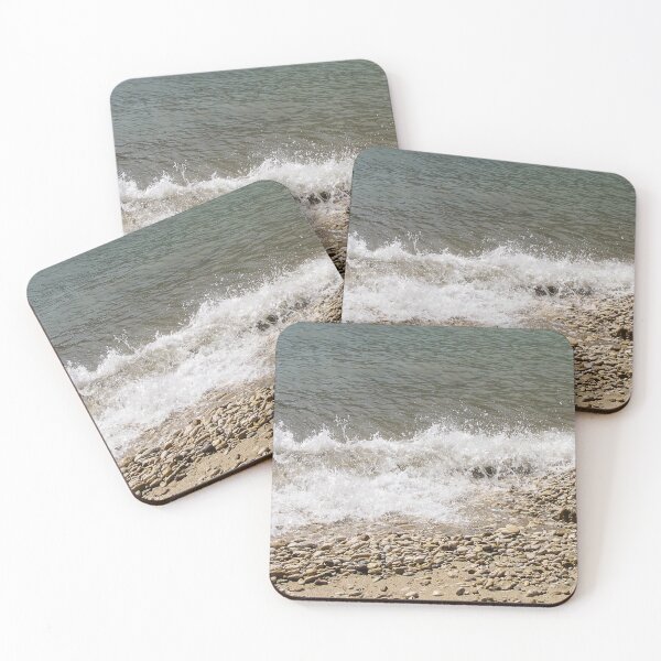 Item preview, Pebble Beach Shoreline With Breaking Waves and Rocky Coastline On A Calm Sea designed and sold by Nmallia.