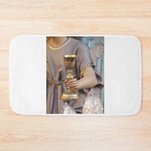 Item preview, Close-Up Of Religious Angel Statue Holding Golden Chalice During Holy Week Procession designed and sold by Nmallia.