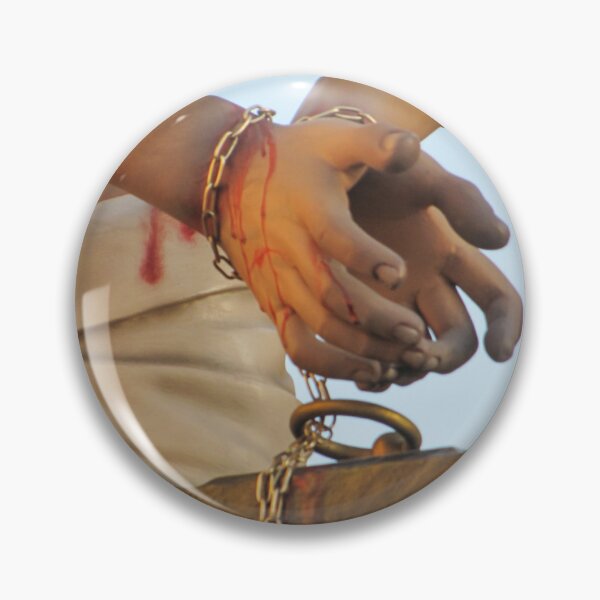 Item preview, Close-Up Of Chained Hands On Religious Statue With Blood Stains During Holy Week Procession designed and sold by Nmallia.