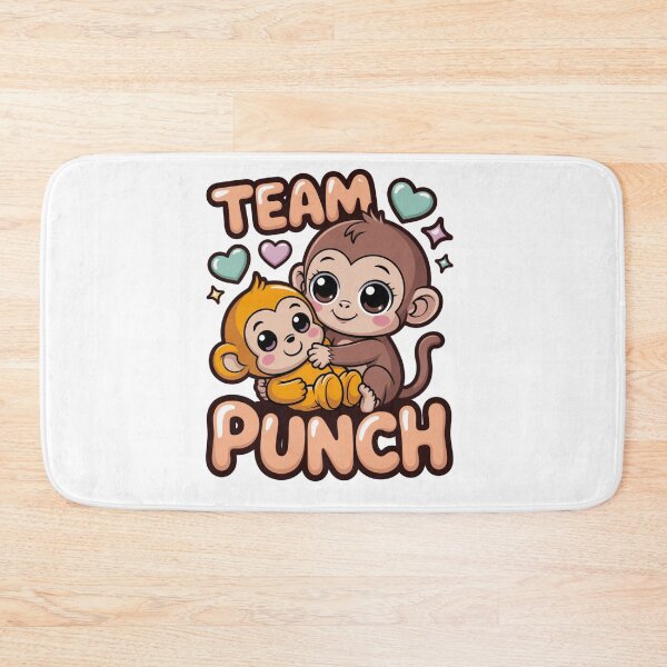 Item preview, Team Punch – Kawaii Brown Girl Monkey Holding Vivid Golden Baby Tee designed and sold by DarylWelsh2024.