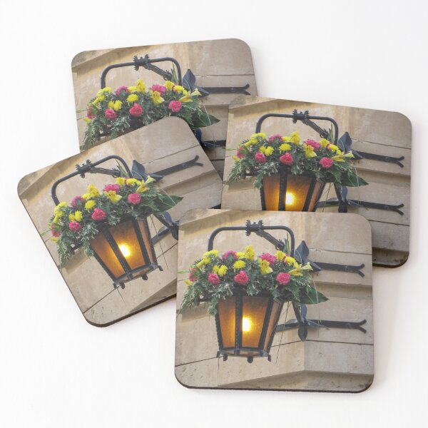 Item preview, Vintage Wall Lantern With Bright Floral Arrangement Hanging On A Stone Street Corner designed and sold by Nmallia.