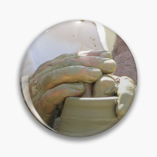Item preview, Potter Shaping Clay on a Spinning Pottery Wheel With Muddy Hands Close-Up of Artisan Craft designed and sold by Nmallia.