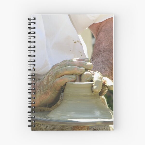 Item preview, Potter Shaping Clay on a Spinning Pottery Wheel With Muddy Hands Close-Up of Artisan Craft designed and sold by Nmallia.