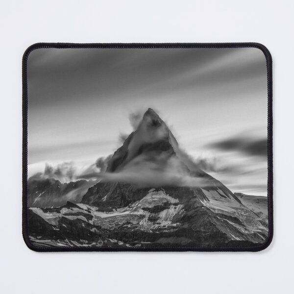 Item preview, Snowcapped Matterhorn peak in the clouds at sunrise, Zermatt, Switzerland black and white photographic art print designed and sold by Astrid Arkhangelsky.