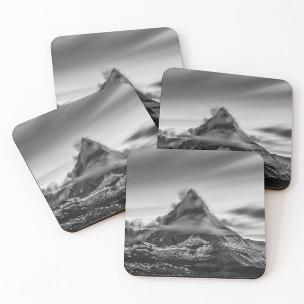 Item preview, Snowcapped Matterhorn peak in the clouds at sunrise, Zermatt, Switzerland black and white photographic art print designed and sold by Astrid Arkhangelsky.