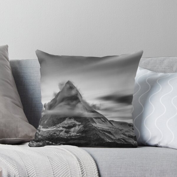 Item preview, Snowcapped Matterhorn peak in the clouds at sunrise, Zermatt, Switzerland black and white photographic art print designed and sold by Astrid Arkhangelsky.