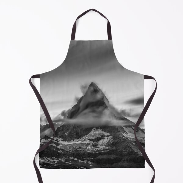 Item preview, Snowcapped Matterhorn peak in the clouds at sunrise, Zermatt, Switzerland black and white photographic art print designed and sold by Astrid Arkhangelsky.