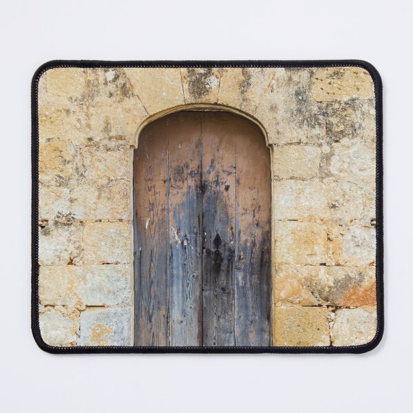 Item preview, Weathered Wooden Door Set in Old Stone Wall With Arched Entrance and Rustic Texture designed and sold by Nmallia.