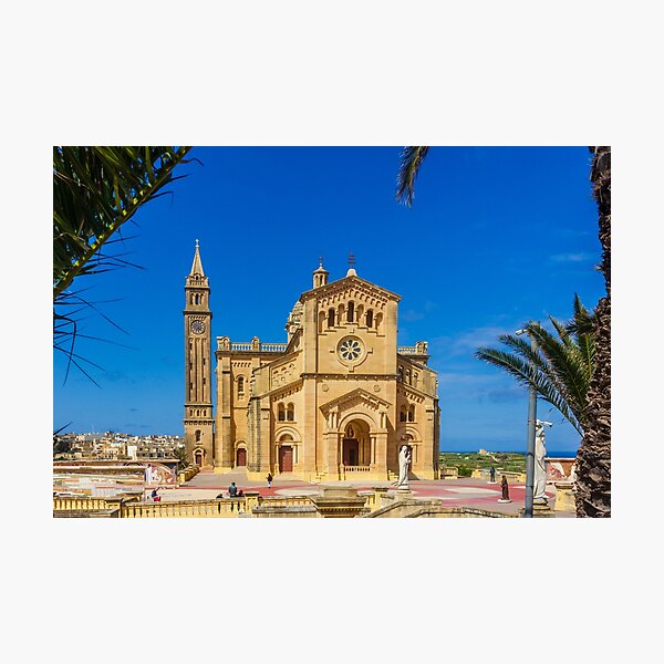 Item preview, Sunlit Stone Basilica On The Maltese Coast With Blue Sky And Bare Spring Branches In Foreground designed and sold by Nmallia.