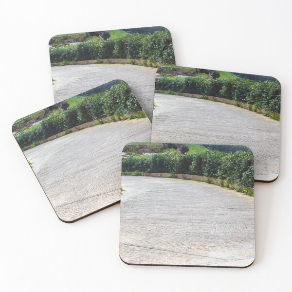 Item preview, Curved Concrete Driveway Lined With Green Hedges And Yellow Wildflowers In Sunny Garden designed and sold by Nmallia.