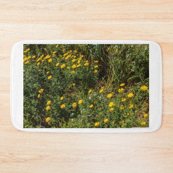 Item preview, Yellow Wildflowers and Daisies Covering a Sunny Spring Meadow in Lush Green Grass designed and sold by Nmallia.