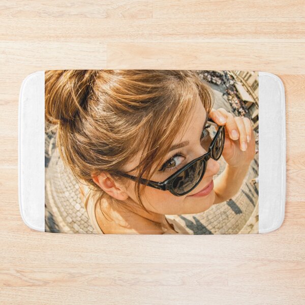 Item preview, Girl Peeking Over Sunglasses in Historic European Plaza designed and sold by NiceArtsPlace.