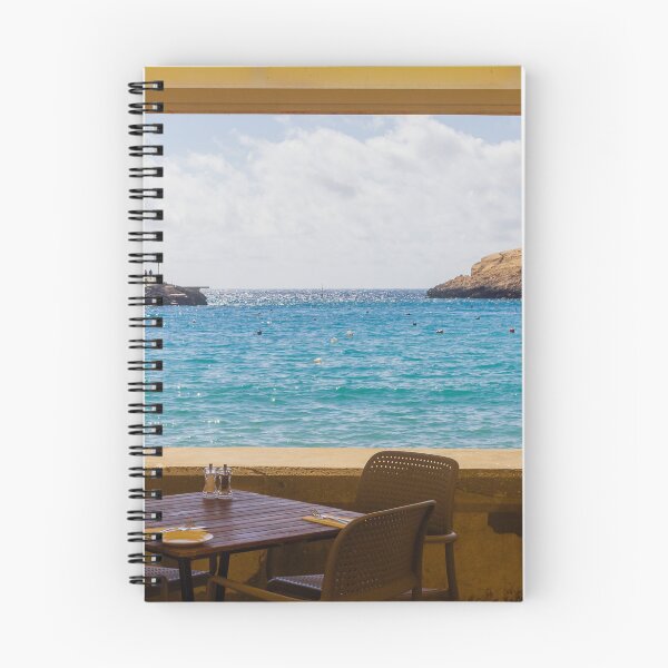 Item preview, Seaside Restaurant Table With Chairs Overlooking Turquoise Mediterranean Bay Through Open Window designed and sold by Nmallia.