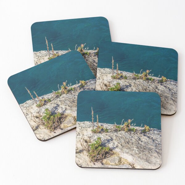 Item preview, Rocky Coastal Cliff With Succulent Plants Overlooking Deep Blue Sea At Sunny Day designed and sold by Nmallia.