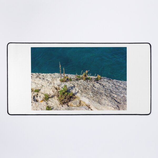 Item preview, Rocky Coastal Cliff With Succulent Plants Overlooking Deep Blue Sea At Sunny Day designed and sold by Nmallia.