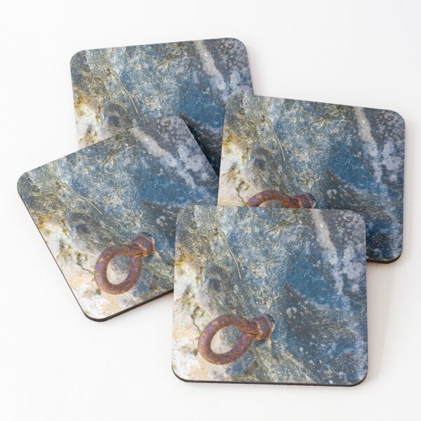Item preview, Rusty Iron Ring Bolt Anchored in Weathered Rock Surface With Textured Stone Background designed and sold by Nmallia.