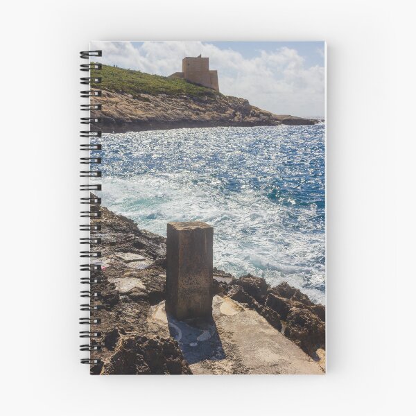 Item preview, Historic Coastal Watchtower On Rocky Headland Over Sparkling Blue Sea Under Sunny Sky And Clouds designed and sold by Nmallia.