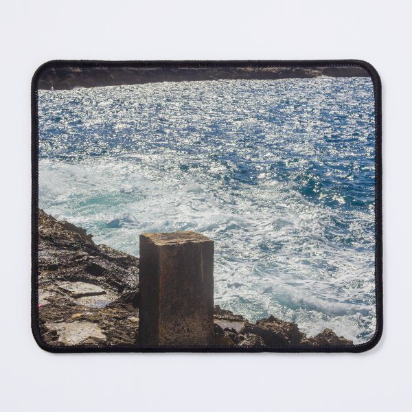 Item preview, Historic Coastal Watchtower On Rocky Headland Over Sparkling Blue Sea Under Sunny Sky And Clouds designed and sold by Nmallia.