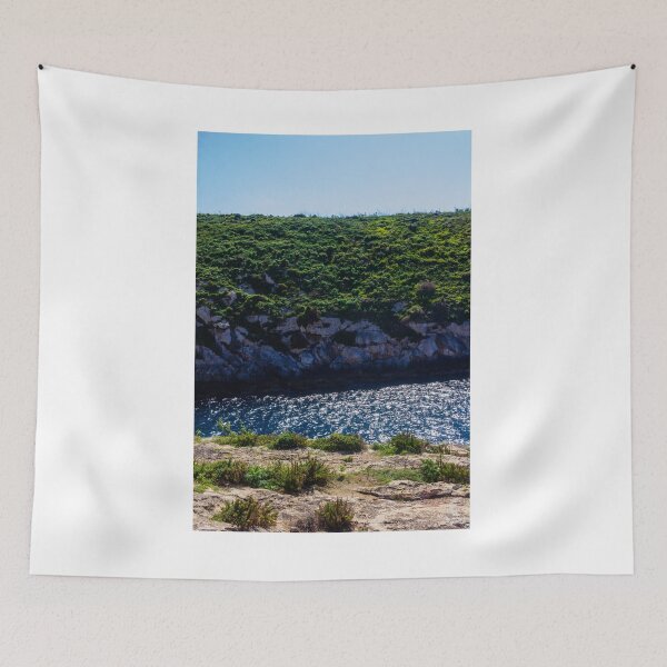 Item preview, Green Coastal Cliff Over Sparkling Blue Sea With Rocky Shoreline On Sunny Summer Day designed and sold by Nmallia.