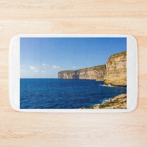 Item preview, Dramatic Limestone Cliffs Over Deep Blue Sea Along A Sunny Coastal Horizon designed and sold by Nmallia.