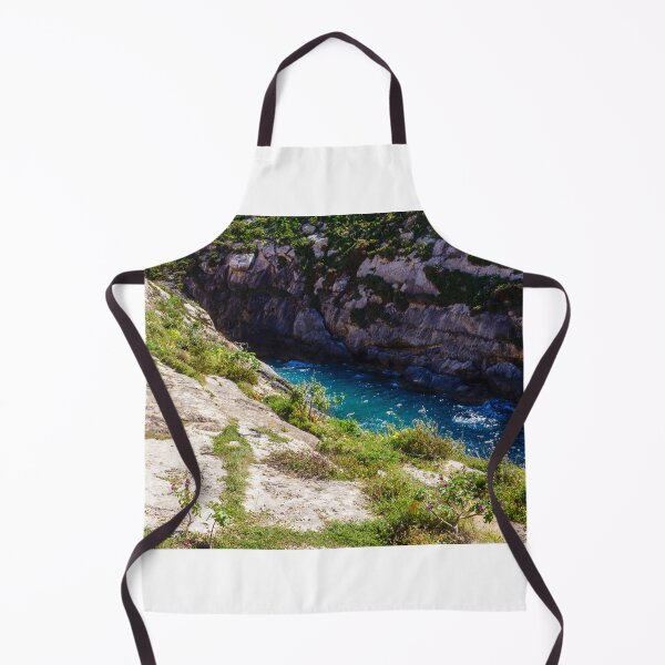 Item preview, Sunlit Rocky Coastal Inlet With Turquoise Water, Wildflowers and Rugged Limestone Cliffs designed and sold by Nmallia.