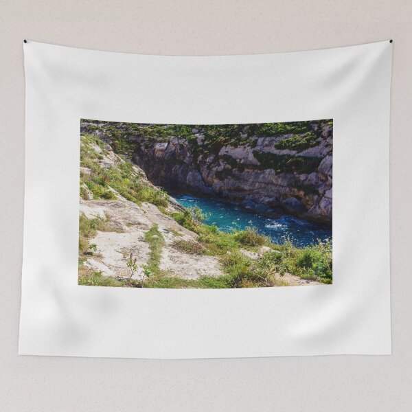 Item preview, Sunlit Rocky Coastal Inlet With Turquoise Water, Wildflowers and Rugged Limestone Cliffs designed and sold by Nmallia.