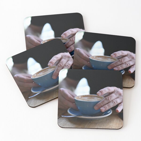 Item preview, Man Holding Cappuccino at Restaurant designed and sold by getmybookstore.