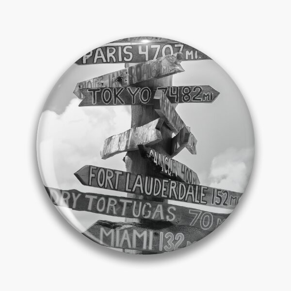 Item preview, Fort Zachary Taylor Beach, Key West direction sign to London, Paris, Nassau, Honolulu, Hawaii black and white photograph designed and sold by Astrid Arkhangelsky.