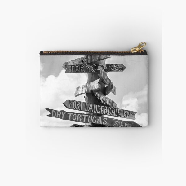 Item preview, Fort Zachary Taylor Beach, Key West direction sign to London, Paris, Nassau, Honolulu, Hawaii black and white photograph designed and sold by Astrid Arkhangelsky.