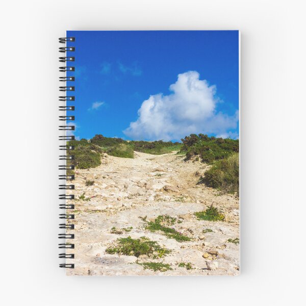 Item preview, Rocky Coastal Path Leading Up Through Scrubland Under A Bright Blue Sky With Puffy Clouds designed and sold by Nmallia.