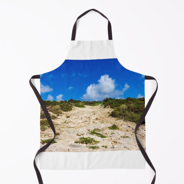 Item preview, Rocky Coastal Path Leading Up Through Scrubland Under A Bright Blue Sky With Puffy Clouds designed and sold by Nmallia.