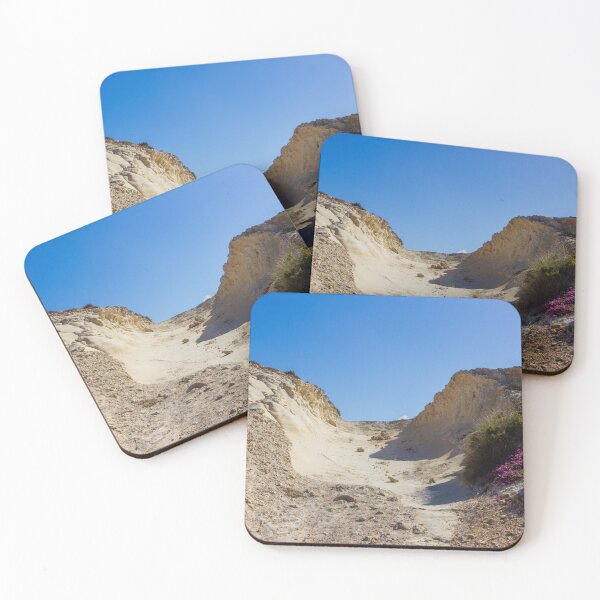 Item preview, Rocky Coastal Path Leading Up Through Scrubland Under A Bright Blue Sky With Puffy Clouds designed and sold by Nmallia.