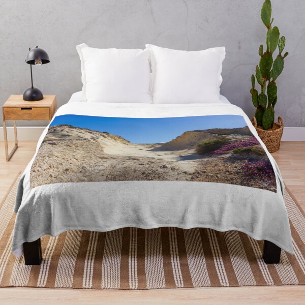 Item preview, Rocky Coastal Path Leading Up Through Scrubland Under A Bright Blue Sky With Puffy Clouds designed and sold by Nmallia.