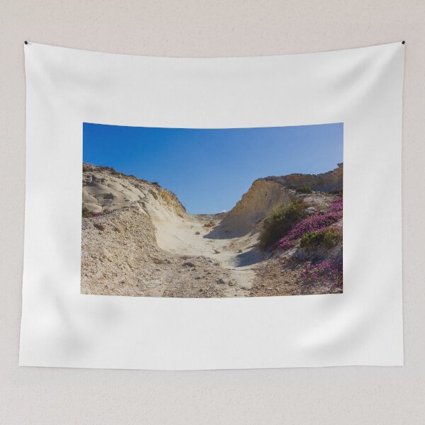 Item preview, Rocky Coastal Path Leading Up Through Scrubland Under A Bright Blue Sky With Puffy Clouds designed and sold by Nmallia.
