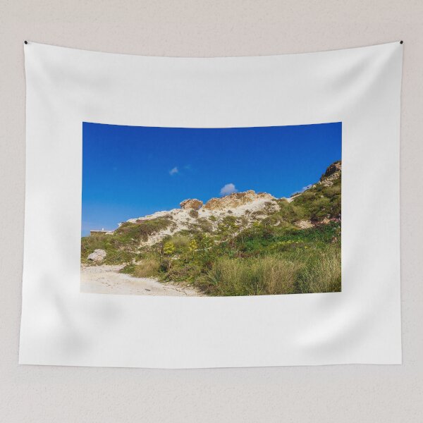 Item preview, Rocky Coastal Path Leading Up Through Scrubland Under A Bright Blue Sky With Puffy Clouds designed and sold by Nmallia.