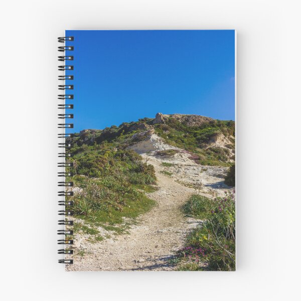 Item preview, Rocky Coastal Path Leading Up Through Scrubland Under A Bright Blue Sky With Puffy Clouds designed and sold by Nmallia.